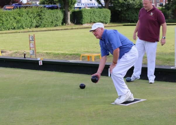 Terry Smith bowls for Vospers