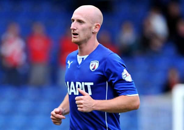 Former Chesterfield right-back Drew Talbot yesterday joined Pompey in a two-year deal