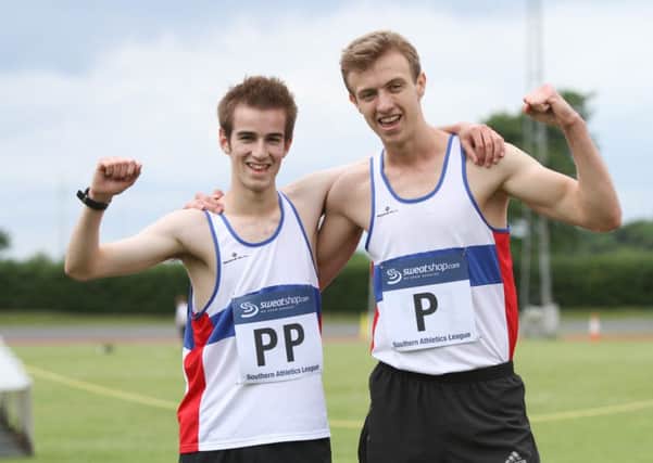 Toby Roe, left, and Tom MacSwayne earned a win double in the 800m for City of Portsmouth at the Mountbatten Centre. Picture: Habibur Rahman (160901-7689)