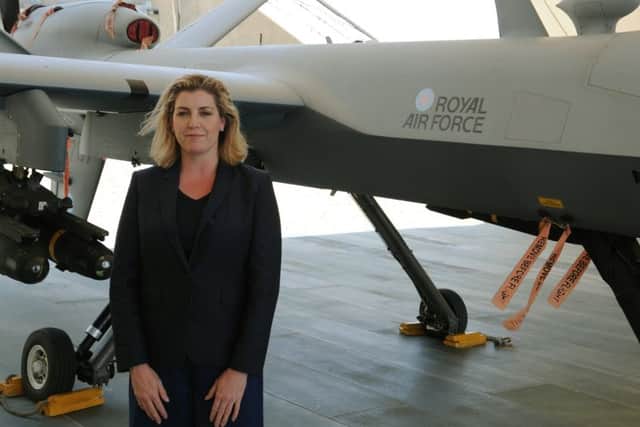 Penny Mordaunt MP with one of the drones used by the RAF