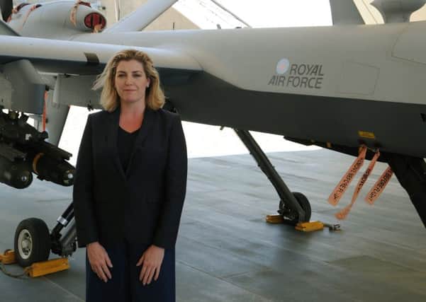 Penny Mordaunt MP with one of the drones used by the RAF