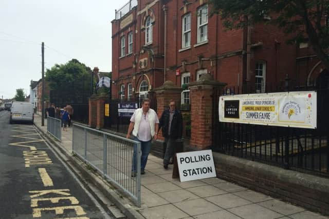 People leaving the polling station at Wimborne Junior School, in Wimborne Road, Southsea, for the EU Referendum PPP-160623-135242001