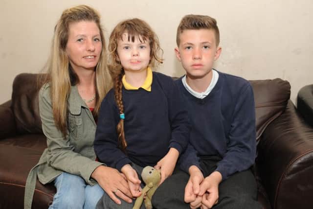 Mandy Davis with her sons Harry, seven, and Marcus, 11
Picture: Sarah Standing (160899-4418)
