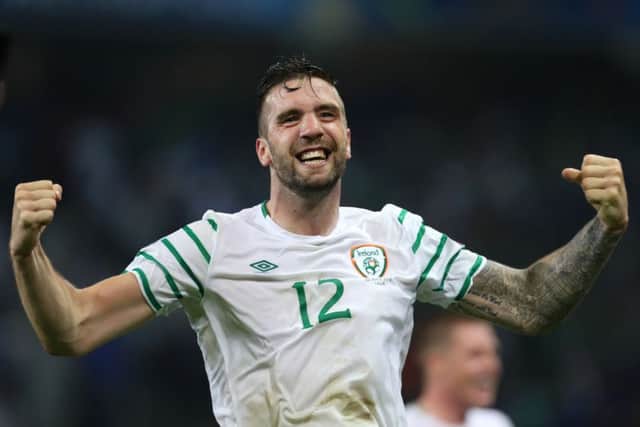 Shane Duffy celebrates Irelands 1-0 win over Italy, which means the Green Army now face France tomorrow in the last 16