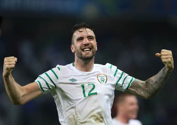 Shane Duffy celebrates Irelands 1-0 win over Italy, which means the Green Army now face France tomorrow in the last 16