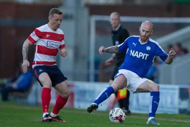 Drew Talbot, right, is a man who Paul Cook believes will be very popular with the Fratton faithful. Picture: James Williamson