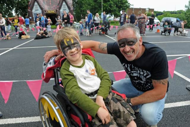 Scott Lyons and his son Finlay, seven
Picture: Ian Hargreaves (160846-4)