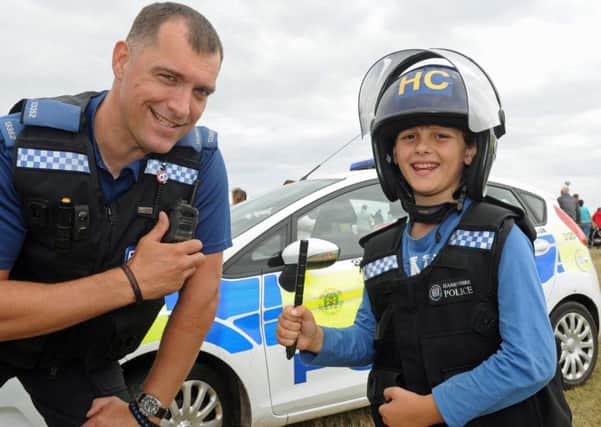 PCSO H Strawn with Riley Hughes from Hayling Island in full regalia. Picture: Ian Hargreaves  (160849-2)