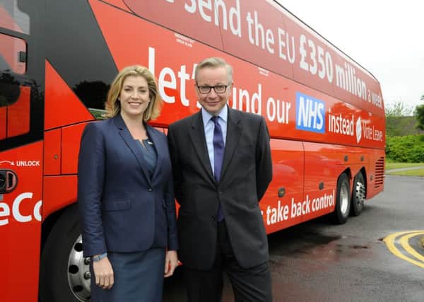 Portsmouth North MP Penny Mordaunt with Michael Gove and the Brexit battlebus in Portsmouth on Wednesday