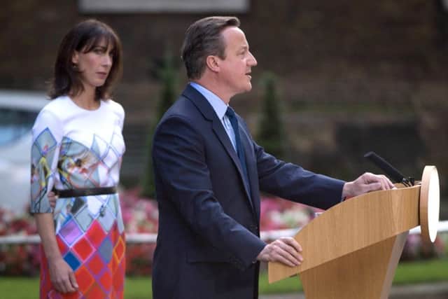 David Cameron announcing his resignation in Downing Street last Friday watched by wife Samantha