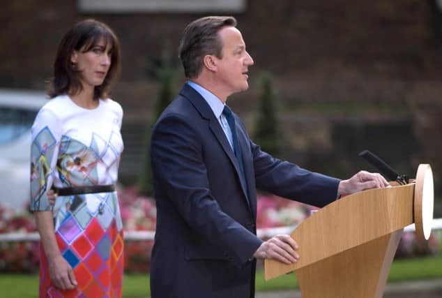 David Cameron announcing his resignation in Downing Street last Friday watched by wife Samantha