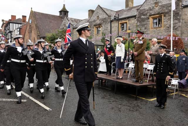 HMS Ledbury sailors march through the centre of Ledbury