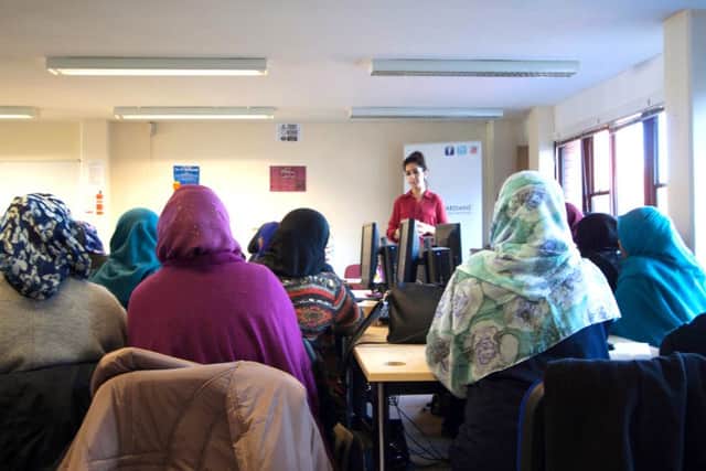 Jan Trust director Sajda Mughal speaks to local women on a Web Guardians course in Portsmouth. Picture: Portsmouth City Council