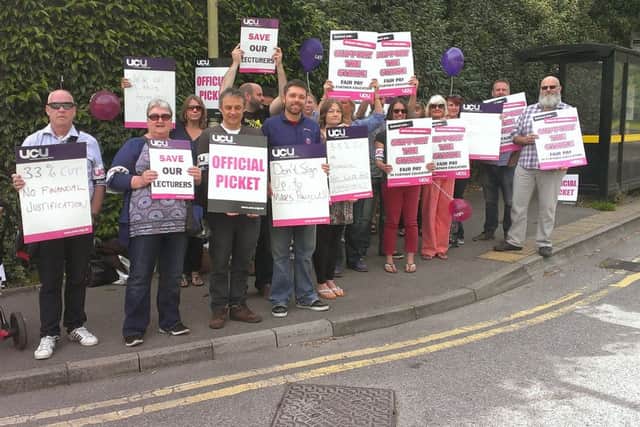 Staff from South Downs College on the picket line at the gates of the college in Waterlooville
Picture: Jeff Travis