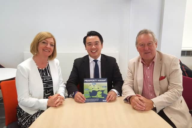 Alan Mak MP with, left, Havant Borough Councils chief executive Sandy Hopkins and leader Cllr Mike Cheshire and the Prosperity Havant report