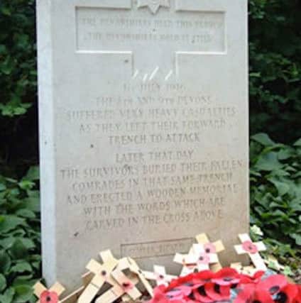 MOVING This is the stone set up at the entrance to the Devonshires Cemetery. In the cross at the top is inscribed: The Devonshires held this trench. The Devonshires hold it still.
