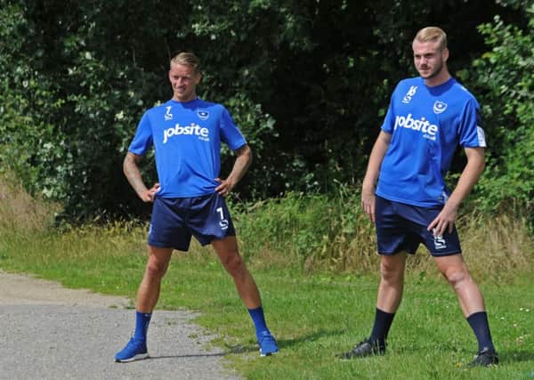 Carl Baker, left, and Jack Whatmough on day one of Pompey training. Picture: Ian Hargreaves
