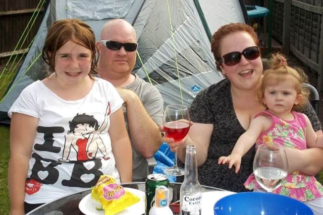 Lindsey Gates with her husband Jason and children Brooke and Charley