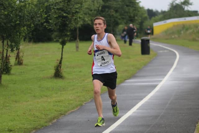 Lachlan Wellington on his way to Lakeside 5k victory. Picture: David Brawn