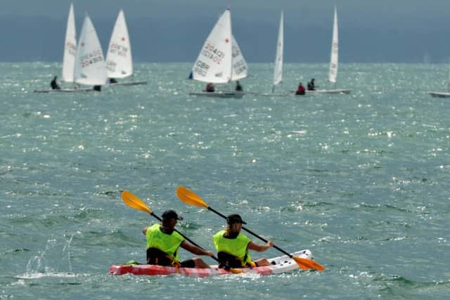 Kayaking firefighters on their fundraising paddle around Hayling Island Picture: Mick Young