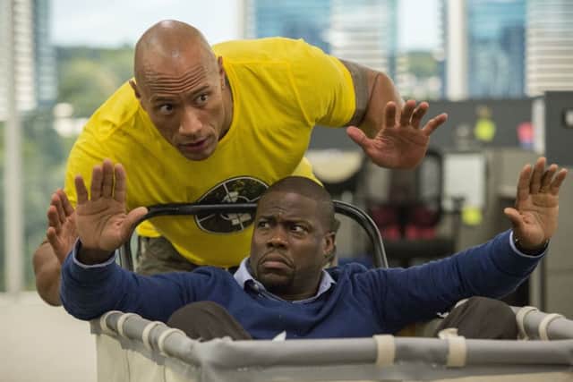 Dwayne Johnson as Bob Magnum and Kevin Hart as Calvin Joyner. PA Photo/Universal.