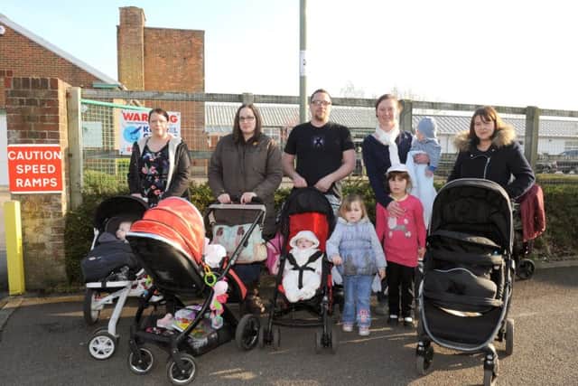 Parents protesting earlier this year against the planned closure of Sure Start centres by Hampshire County Council Picture: Sarah Standing (160513-7191)