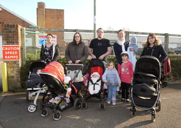Parents protesting earlier this year against the planned closure of Sure Start centres by Hampshire County Council Picture: Sarah Standing (160513-7191)