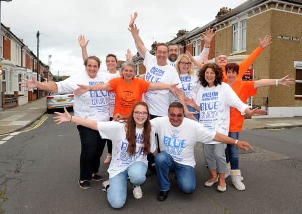 Tom Prince's family celebrate after reaching Blue Day's Â£1m target 

Picture: Sarah Standing (160930-5664)