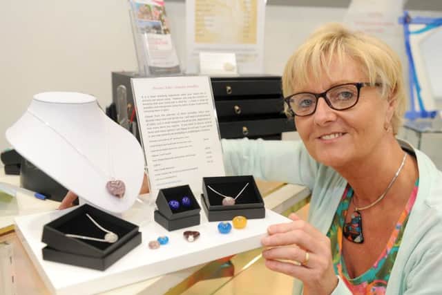 Karen Taylor makes jewellery from cremation ashesPicture: Sarah Standing (160814-2505)