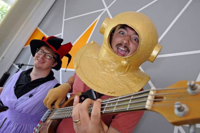 A Jamathon for 12 hours non-stop to raise funds for Stella's Voice (left) Tim Button on the drums with (right) guitarist Shaun Hall at The Portsmouth Music Academy in Cosham Picture by: Malcolm Wells (160701-4228)