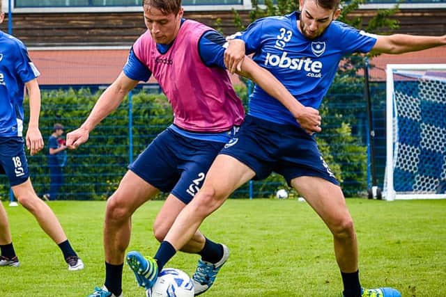 Tom Davies, left, and Ben Close challenge for the ball during pre-season training Picture: Colin Famery