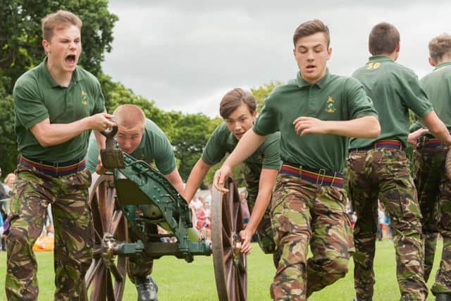 Members of the Royal Marines Cadets from HMS Excellent in action during a running of the field gun competition Picture by Keith Woodland