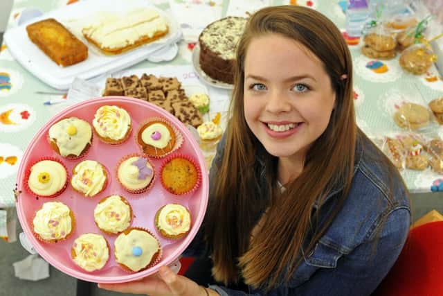 Molly Ward, 14, with some tasty-looking cakes
Picture by: Malcolm Wells (160702-4686)