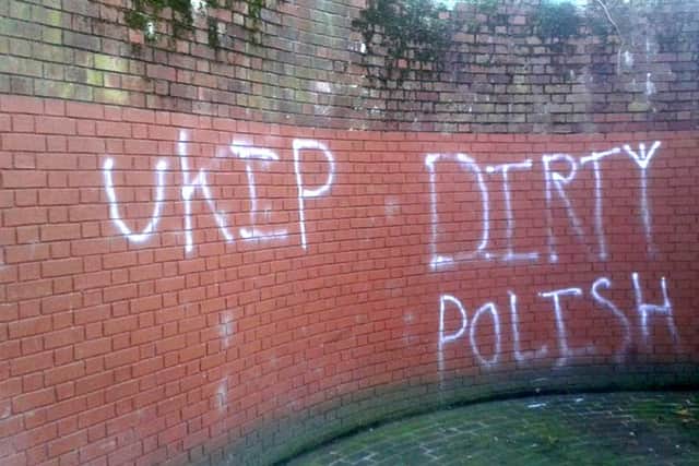Racist grafitti spray-painted on the wall near the war memorial at Guildhall Square in Portsmouth
