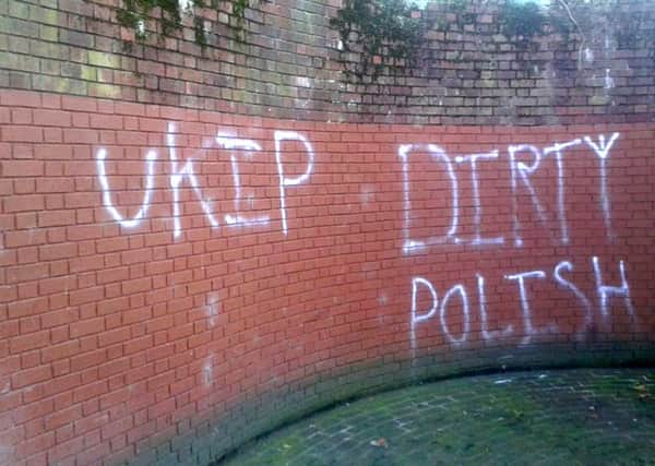 Racist grafitti spray-painted on the wall near the war memorial at Guildhall Square in Portsmouth
