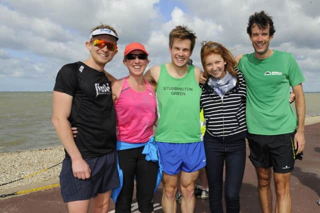 Left to right: Joe Paterson with Simone Paterson, both from Melbourne, Australia, Chris Brobin with his wife Natalie Brobin and close running friend Mike Gregory. Picture: Malcolm Wells (160702-4514)