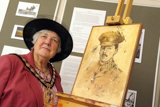 The Mayor of Havant Cllr Faith Ponsonby opened a new exhibition at Emsworth Museum about the Somme, which includes a painting of Second Lieutenant Archie Paxton whose family home was Brookfield House, which is now The Brookfield Hotel in Emsworth 
Picture: Malcolm Wells (160701-4271)