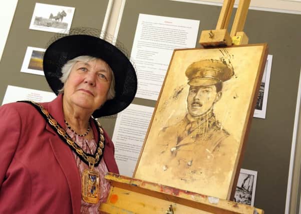 The Mayor of Havant Cllr Faith Ponsonby opened a new exhibition at Emsworth Museum about the Somme, which includes a painting of Second Lieutenant Archie Paxton whose family home was Brookfield House, which is now The Brookfield Hotel in Emsworth 


Picture: Malcolm Wells (160701-4271)