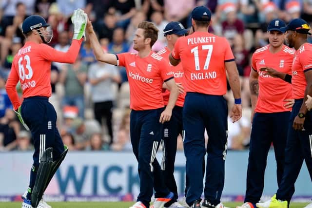 Star man Jos Buttler, left, congratulates Liam Dawson. Picture: Dave Vokes/LMI Photography