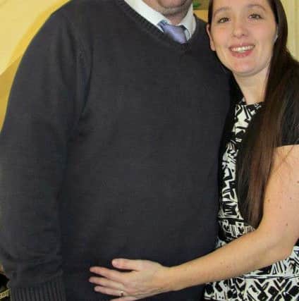 Craig Sterne with his wife Laura before he lost the weight