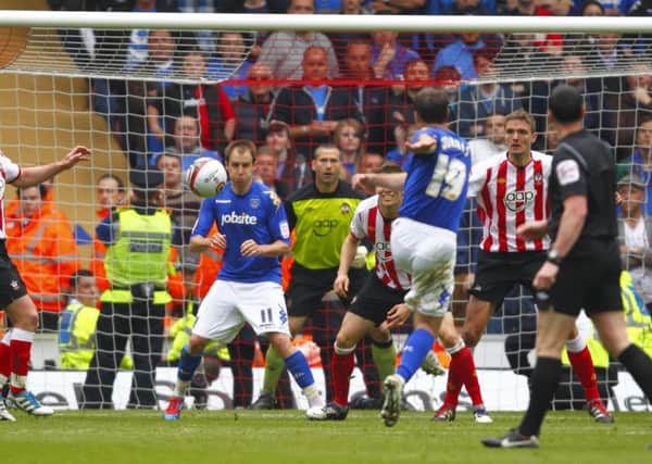 David Norris cracks in his last-gasp leveller in Pompey's 2-2 draw at Southampton in April, 2012 - the last time the two teams met