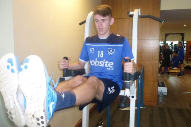 Ben Tollitt works on his core strength