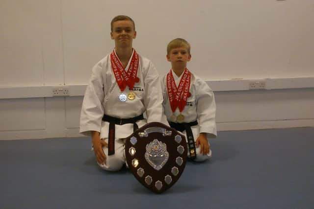 Alfie Cunningham, left, and William Cunningham