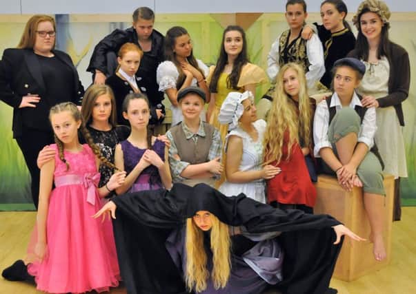The cast of Into The Woods Jr by the Academy of Musical Theatre