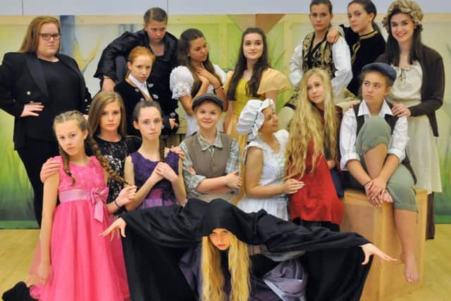 The cast of Into The Woods Jr by the Academy of Musical Theatre