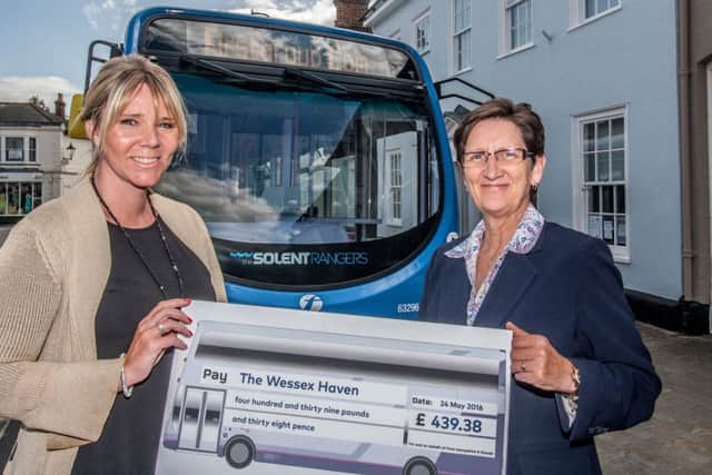 Heidi Rehman, the Wessex Havens Community Fundraiser and Chrissie Bainbridge, First Hampshires Business Performance Director with one of First Buss Solent Rangers vehicles that stop right outside the charitys centre in Titchfield