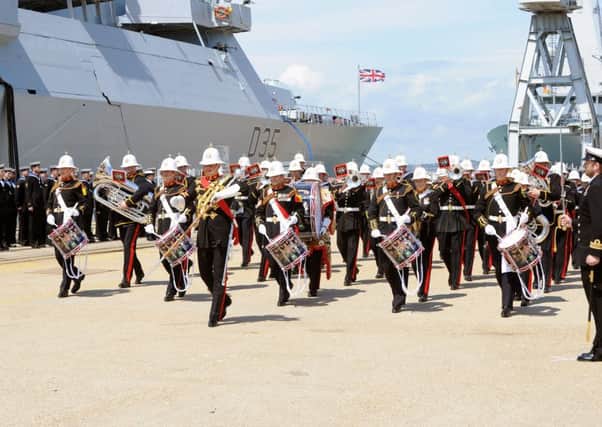 The Band of Her Majesty's Royal Marines Collingwood at the HMS Dragon rededication ceremony 
Picture: Sarah Standing (160941-3402)