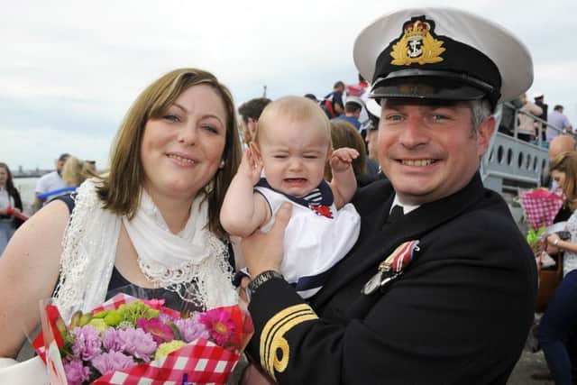 Lt Cdr Richard Chambers with his daughter Clemency, seven months, and wife Leanne Picture: Malcolm Wells (160707-4917)