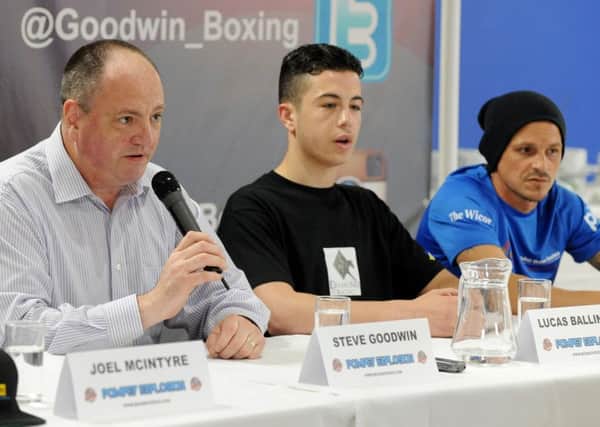 Lucas Ballingall, centre, with promotor Steve Goodwin, left, and Dave Birmingham  Picture: Sarah Standing