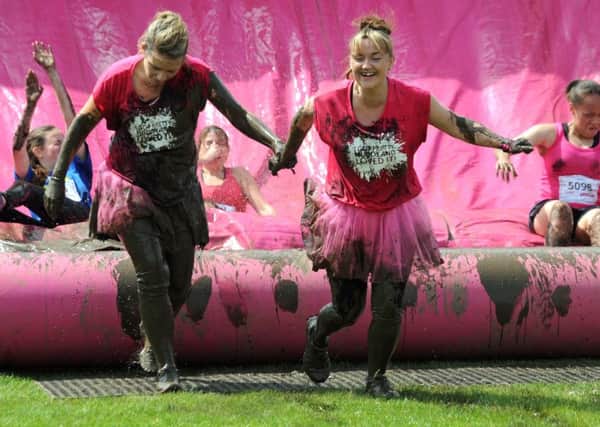 Competitors take part in the Race For Life, Pretty Muddy event on Southsea Common.
Picture: Ian Hargreaves (160972-1)